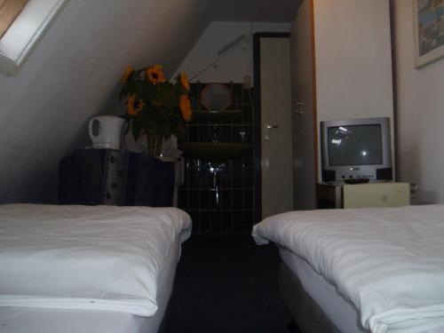 Budget Hotel Thorbecke Амстердам Стая снимка