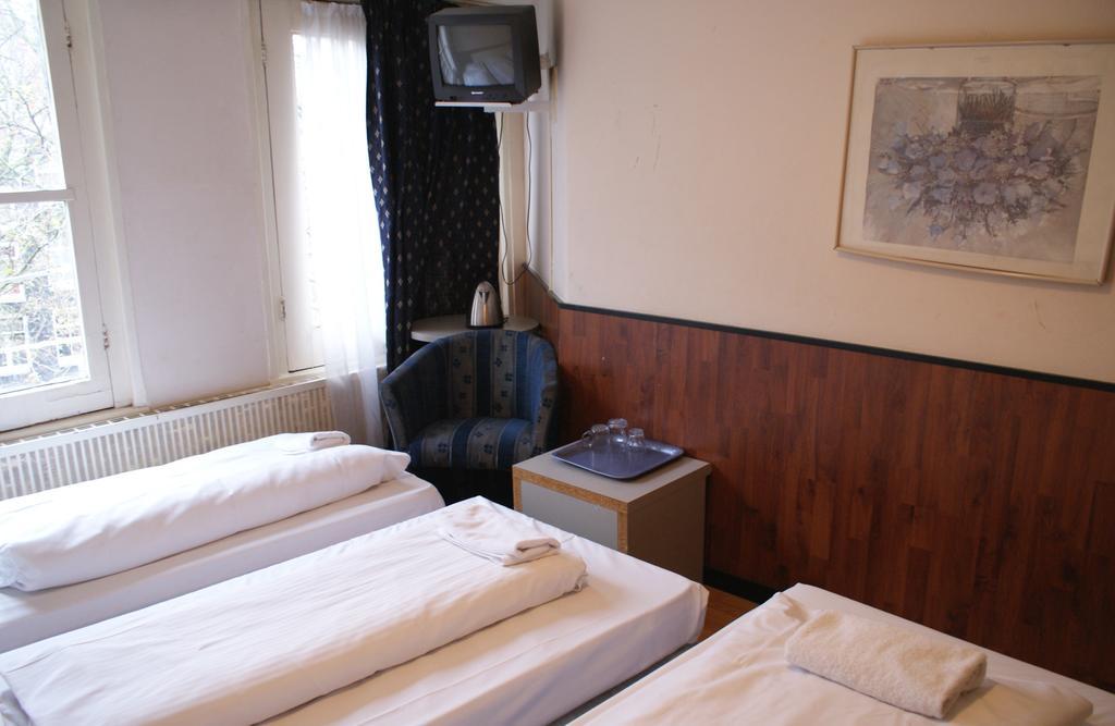 Budget Hotel Thorbecke Амстердам Стая снимка